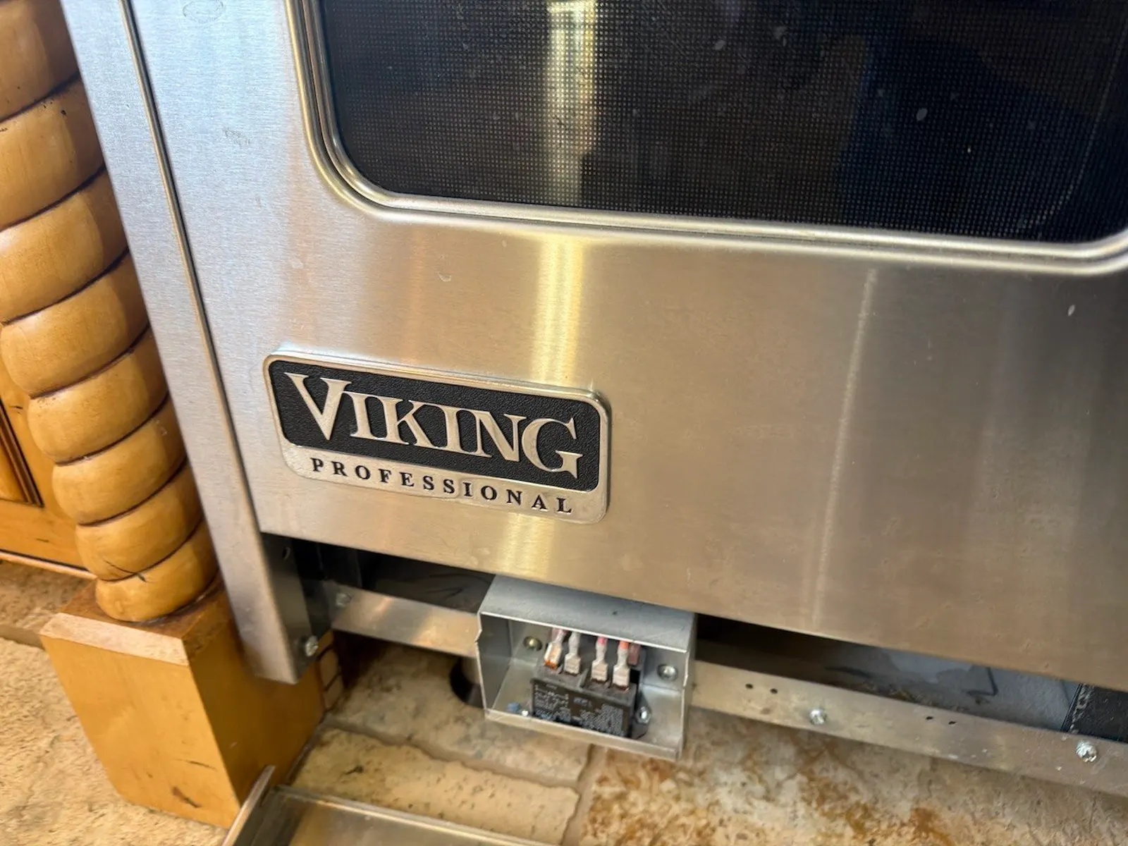 Viking range close-up during inspection by Elevate Repair